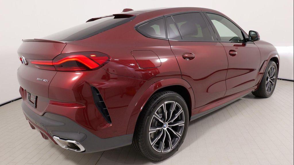 used 2025 BMW X6 car, priced at $70,999