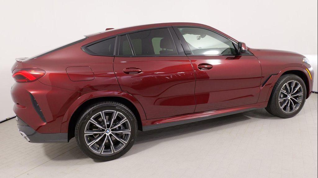 used 2025 BMW X6 car, priced at $70,999
