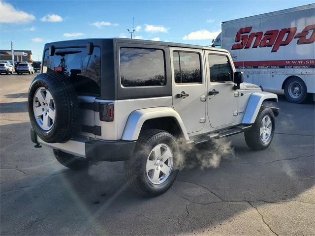 used 2012 Jeep Wrangler Unlimited car, priced at $15,995