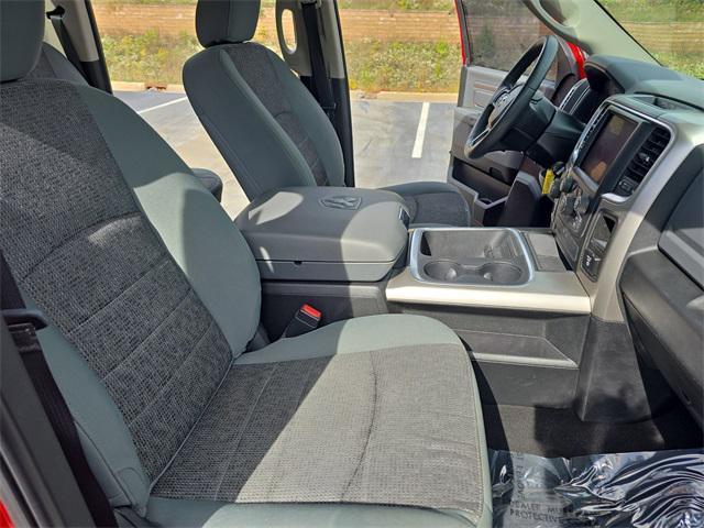 used 2018 Ram 1500 car, priced at $26,504