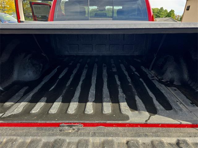 used 2018 Ram 1500 car, priced at $26,504