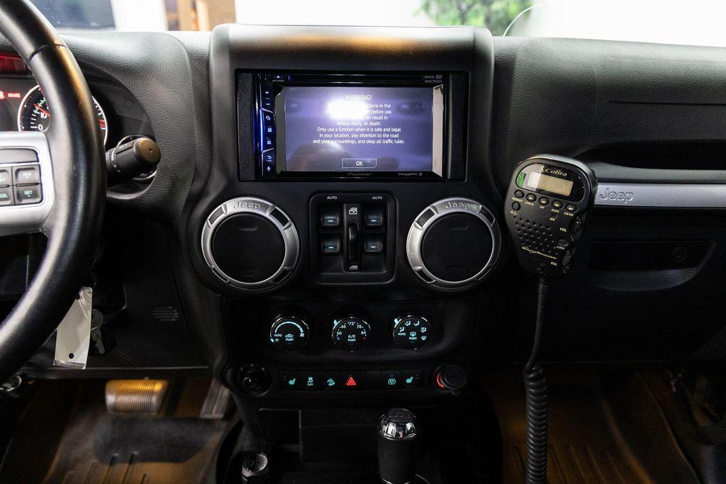 used 2016 Jeep Wrangler Unlimited car, priced at $49,990