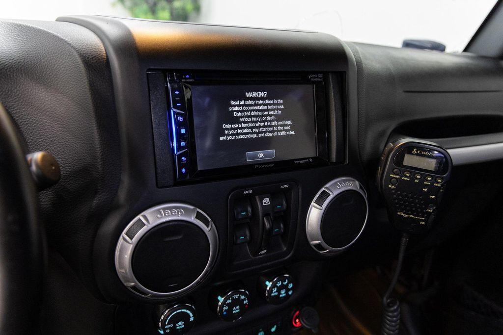 used 2016 Jeep Wrangler Unlimited car, priced at $49,990