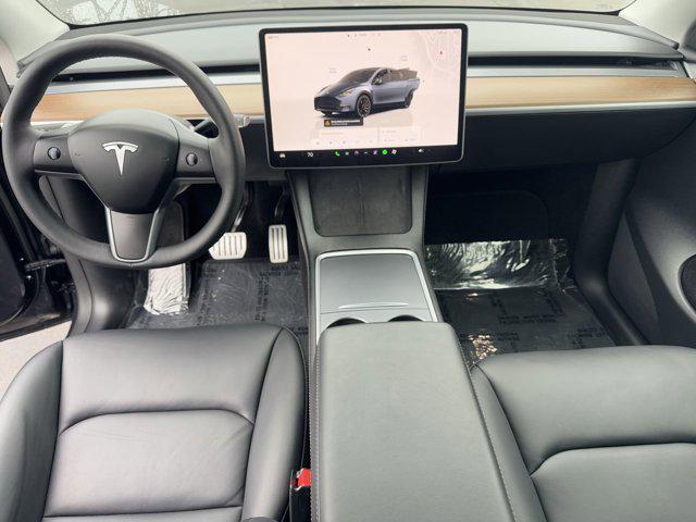 used 2024 Tesla Model Y car, priced at $43,988