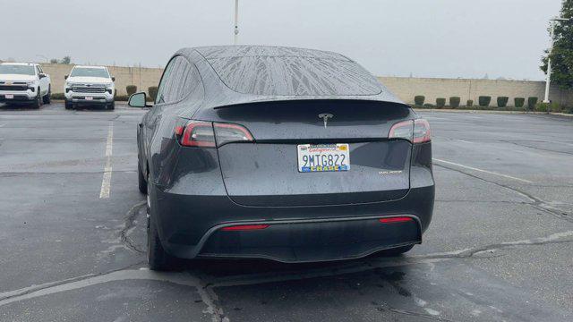 used 2024 Tesla Model Y car, priced at $43,988