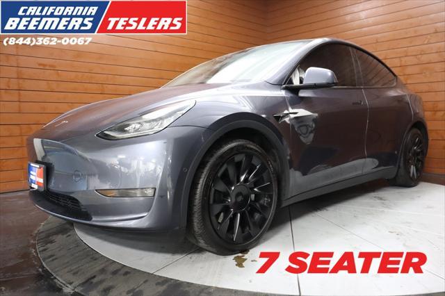 used 2022 Tesla Model Y car, priced at $32,990