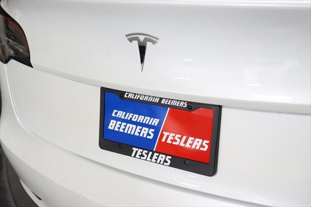 used 2021 Tesla Model 3 car, priced at $25,590