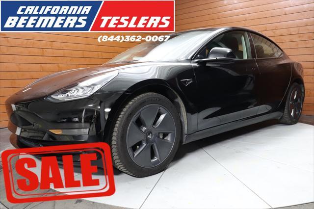 used 2022 Tesla Model 3 car, priced at $26,990