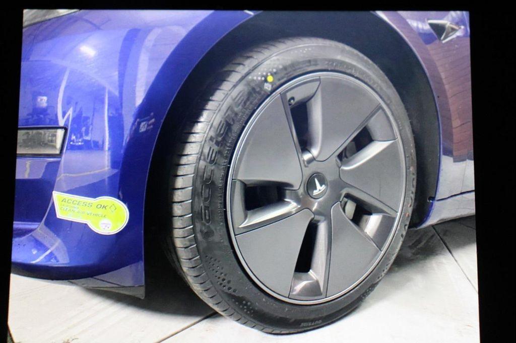 used 2023 Tesla Model 3 car, priced at $22,490