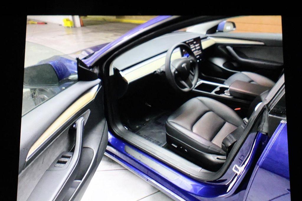 used 2023 Tesla Model 3 car, priced at $22,490