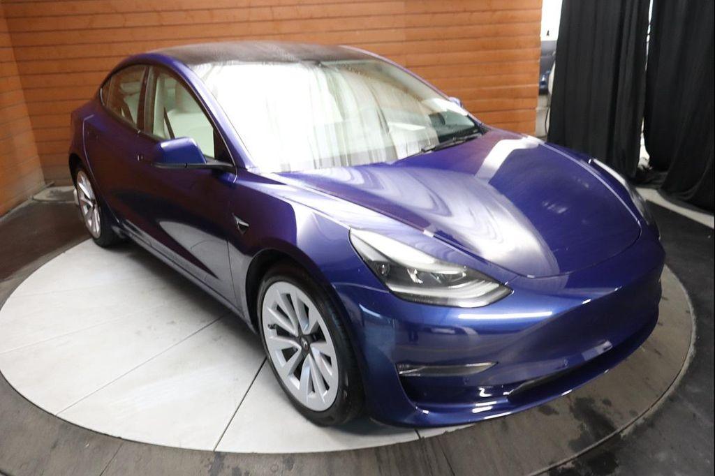 used 2023 Tesla Model 3 car, priced at $26,490
