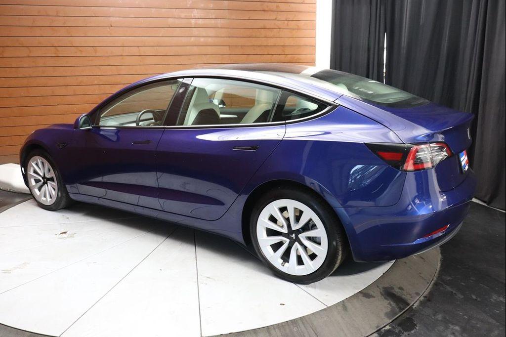 used 2023 Tesla Model 3 car, priced at $26,490