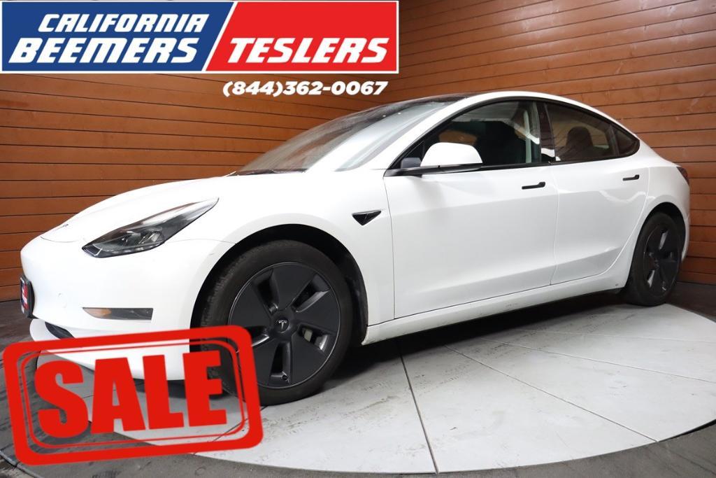 used 2023 Tesla Model 3 car, priced at $26,290