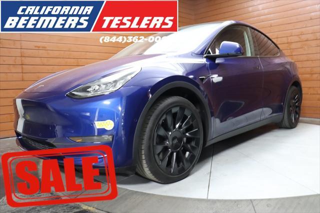 used 2021 Tesla Model Y car, priced at $28,990