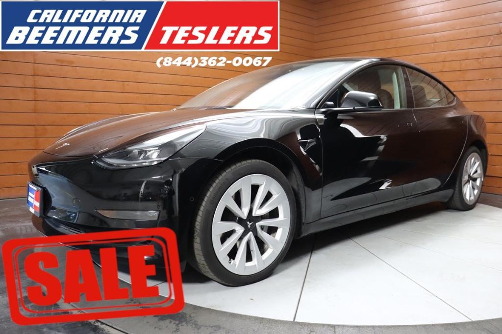 used 2022 Tesla Model 3 car, priced at $28,490