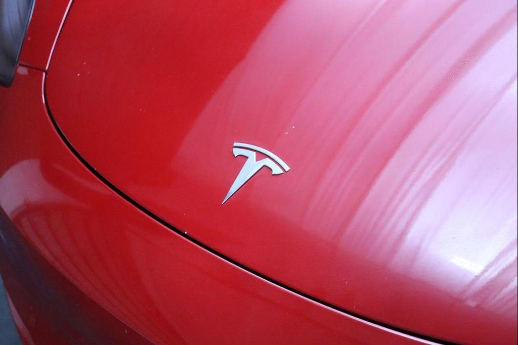 used 2023 Tesla Model 3 car, priced at $21,999