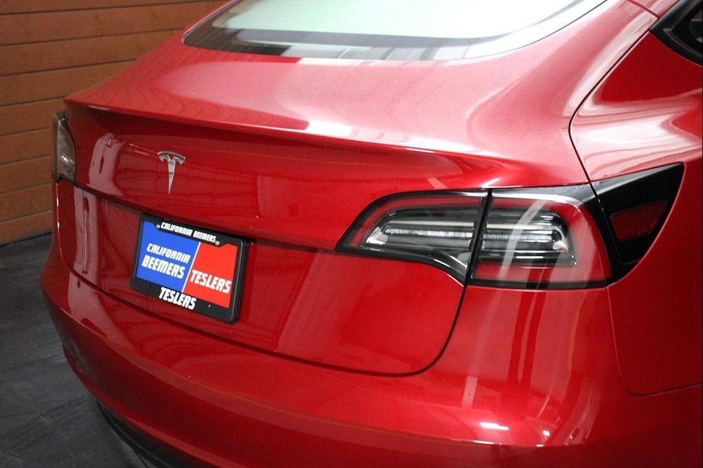 used 2023 Tesla Model 3 car, priced at $21,999