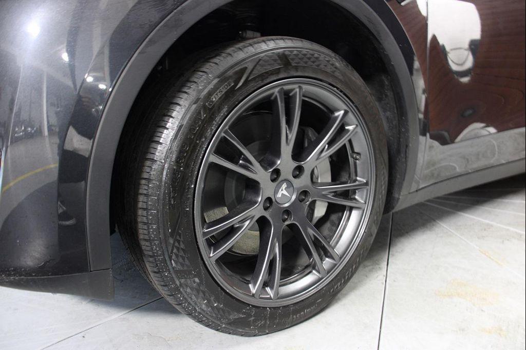 used 2024 Tesla Model Y car, priced at $33,190