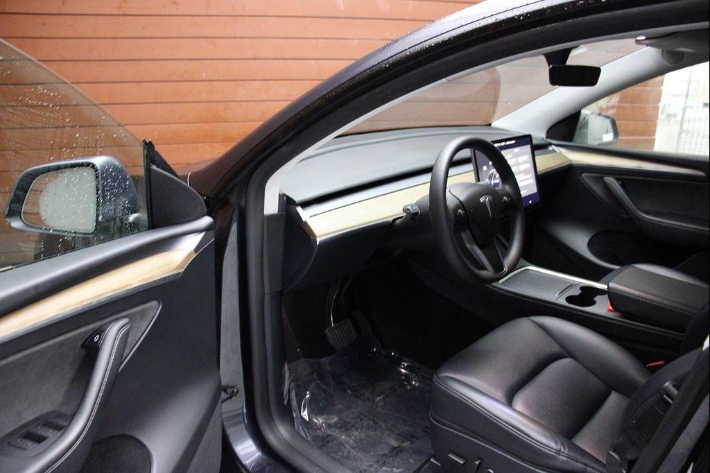 used 2024 Tesla Model Y car, priced at $33,190