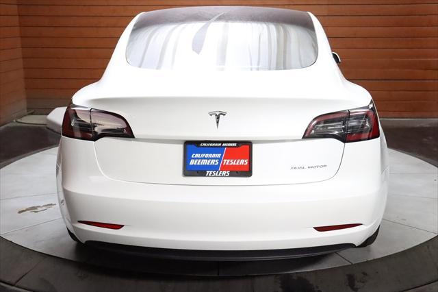 used 2023 Tesla Model 3 car, priced at $27,990