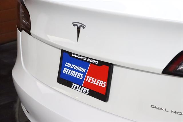 used 2023 Tesla Model 3 car, priced at $27,990