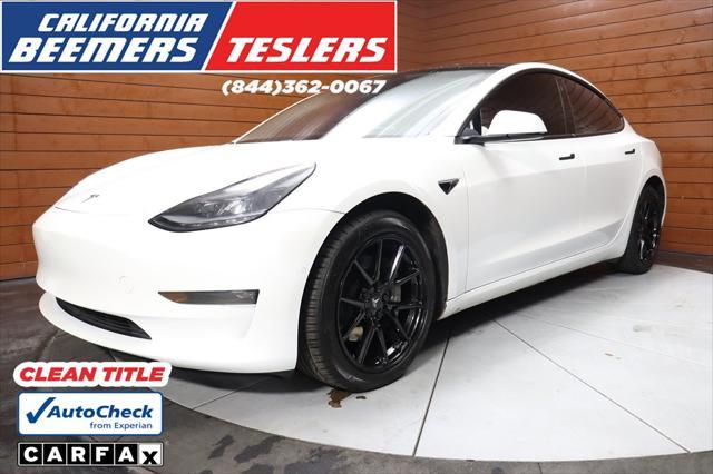 used 2023 Tesla Model 3 car, priced at $27,990