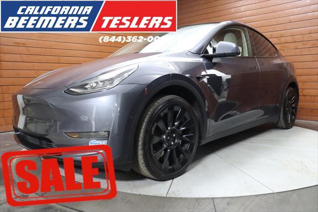 used 2021 Tesla Model Y car, priced at $29,490