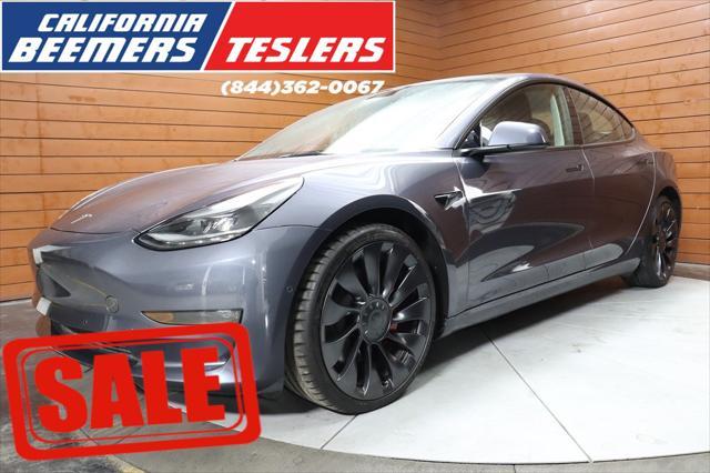 used 2022 Tesla Model 3 car, priced at $31,990