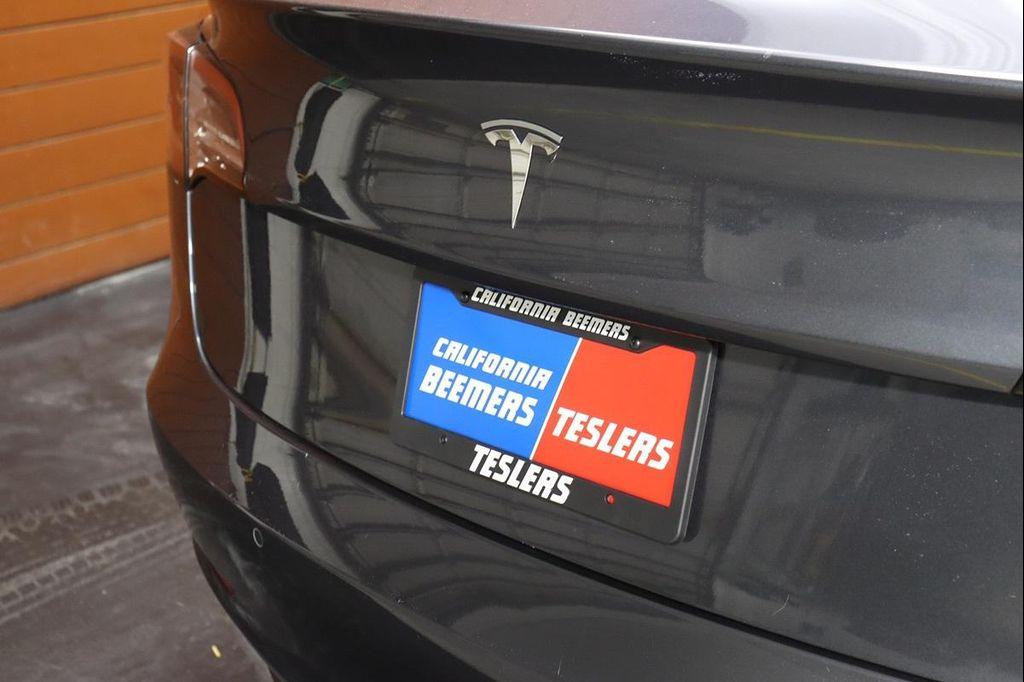 used 2022 Tesla Model 3 car, priced at $20,990