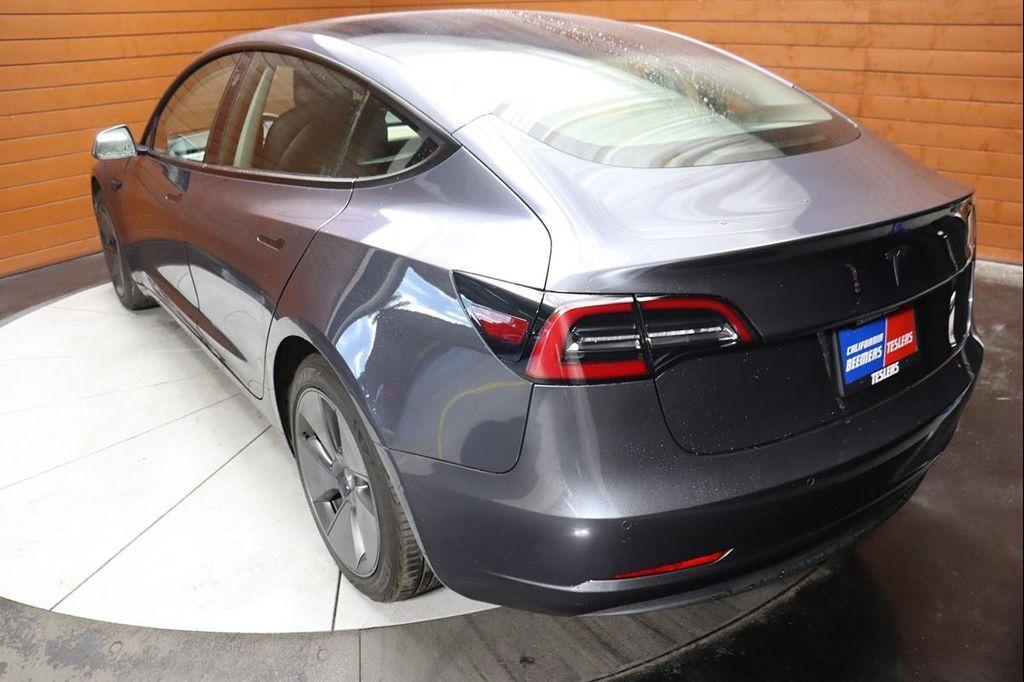 used 2023 Tesla Model 3 car, priced at $22,490