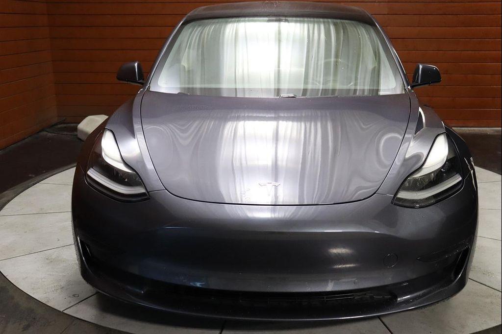 used 2023 Tesla Model 3 car, priced at $22,490