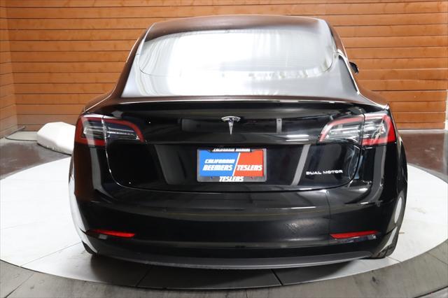 used 2022 Tesla Model 3 car, priced at $27,960