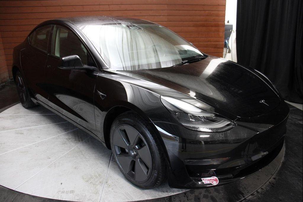 used 2023 Tesla Model 3 car, priced at $23,490
