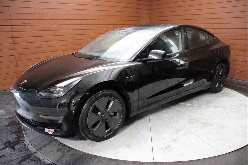 used 2023 Tesla Model 3 car, priced at $23,490