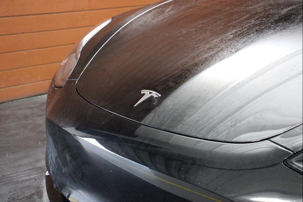 used 2023 Tesla Model 3 car, priced at $23,490