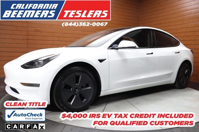 used 2023 Tesla Model 3 car, priced at $20,999