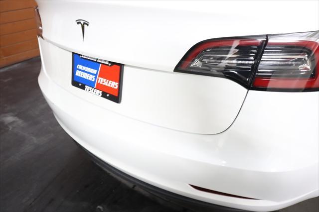 used 2023 Tesla Model 3 car, priced at $20,999
