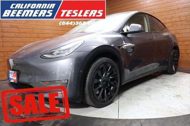 used 2021 Tesla Model Y car, priced at $27,490