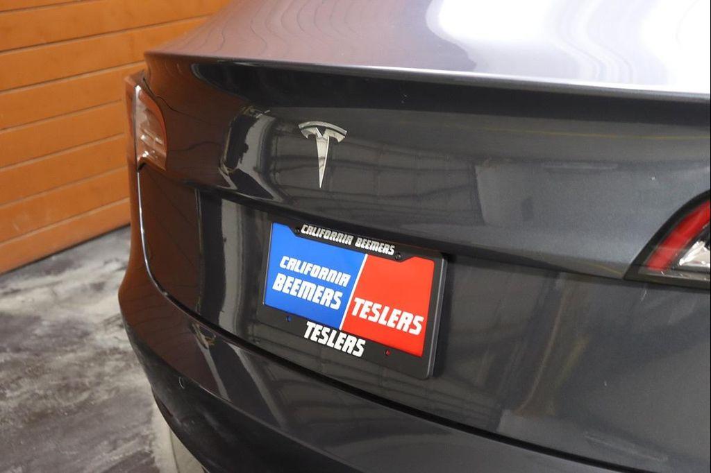 used 2023 Tesla Model 3 car, priced at $23,490