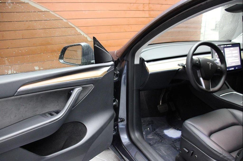 used 2023 Tesla Model Y car, priced at $30,990