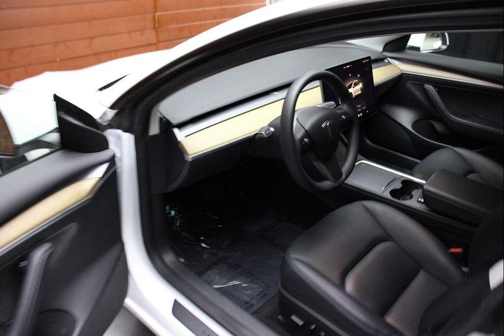 used 2023 Tesla Model 3 car, priced at $20,499