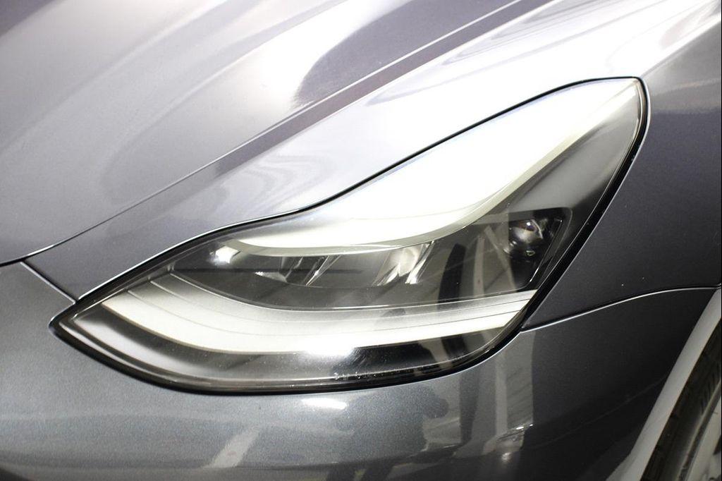 used 2023 Tesla Model 3 car, priced at $21,990