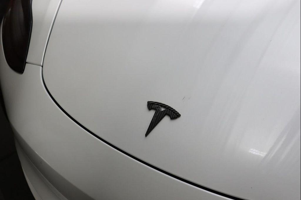 used 2023 Tesla Model 3 car, priced at $20,490