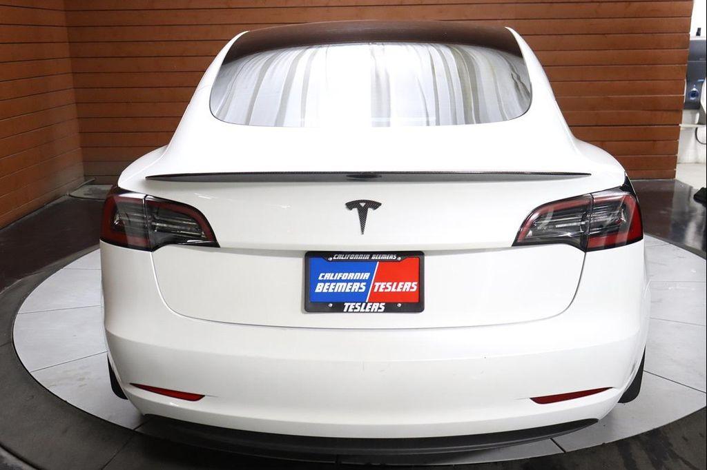 used 2023 Tesla Model 3 car, priced at $20,490