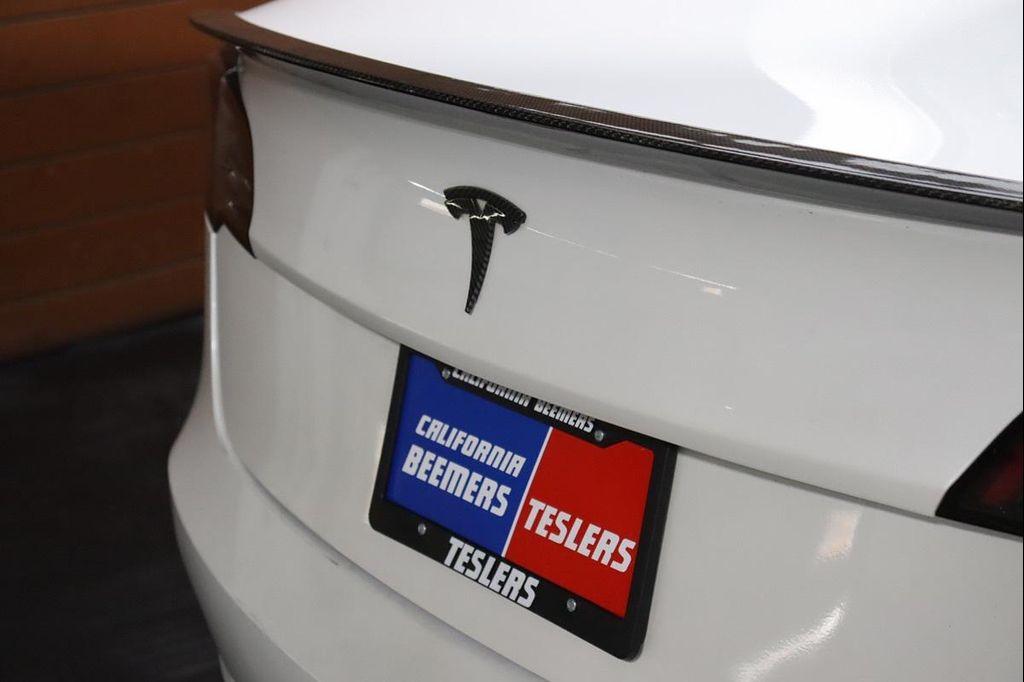 used 2023 Tesla Model 3 car, priced at $20,490