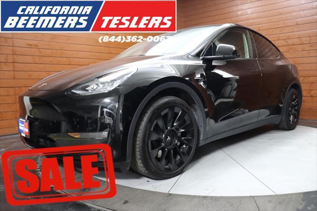 used 2021 Tesla Model Y car, priced at $28,999