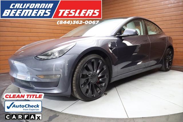 used 2022 Tesla Model 3 car, priced at $27,990