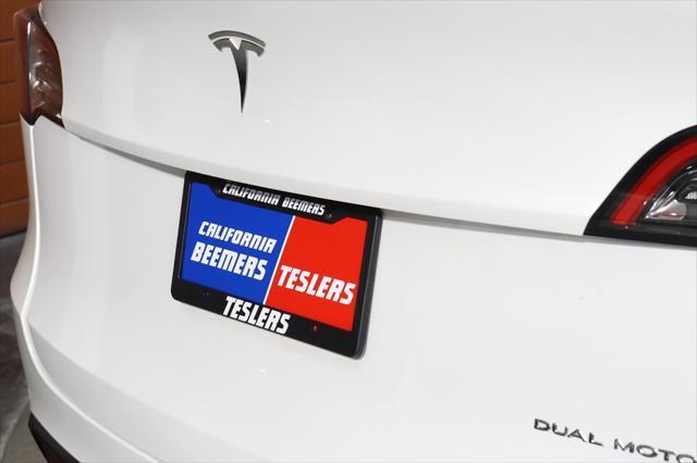 used 2021 Tesla Model Y car, priced at $29,990