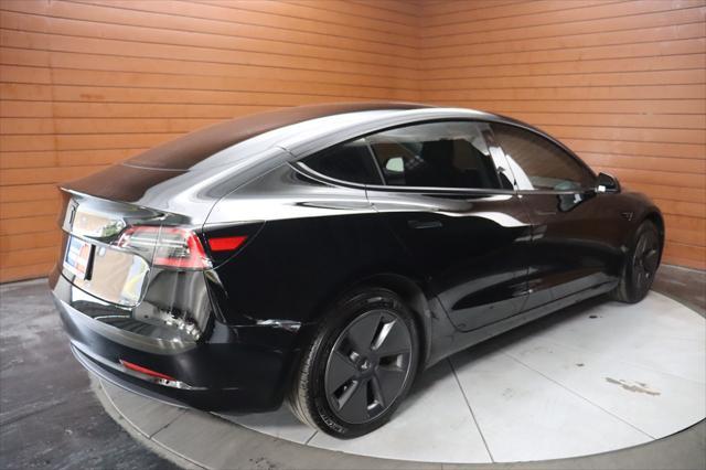 used 2023 Tesla Model 3 car, priced at $25,990