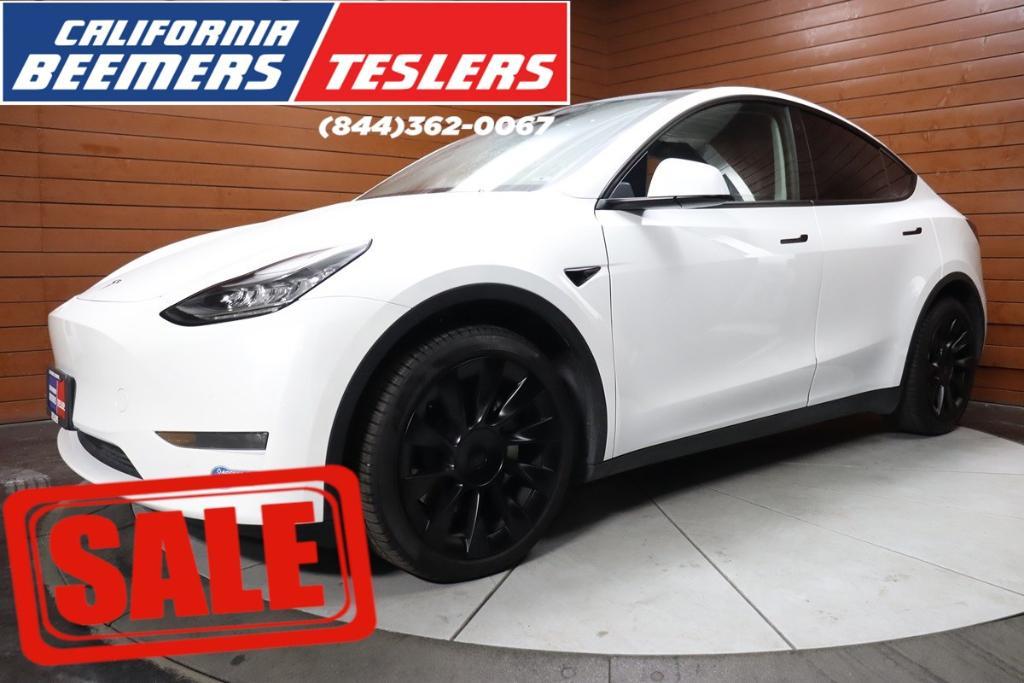 used 2021 Tesla Model Y car, priced at $33,290